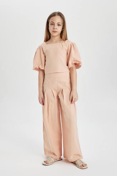 بلوزة بناتي نص كم برتقالي