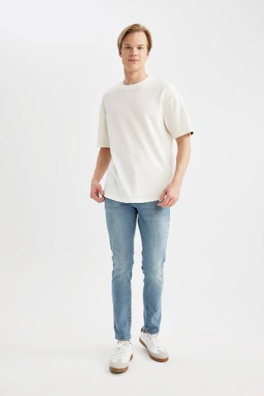 بنطرون جينز كارلو سكيني فيت بخصر عادي