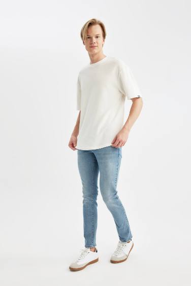 بنطرون جينز كارلو سكيني فيت بخصر عادي