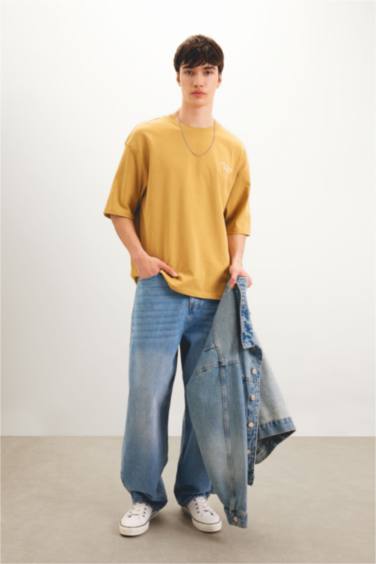 تيشيرت قصة فضفاضة مطبوع برقبة مستديرة