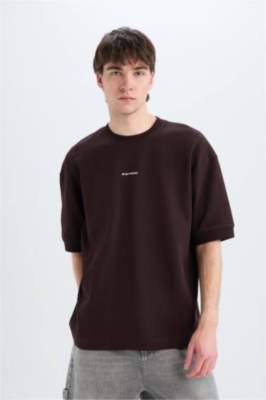 تيشيرت مطبوع قصة فضفاضة برقبة مستديرة