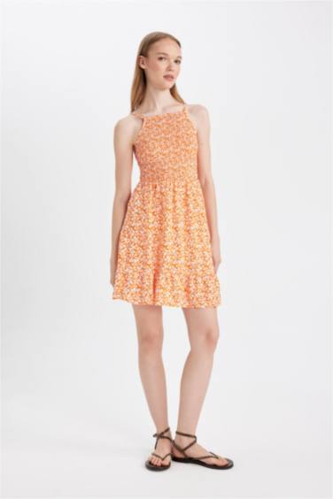 Mini Robe fleurie à bretelles et col licou