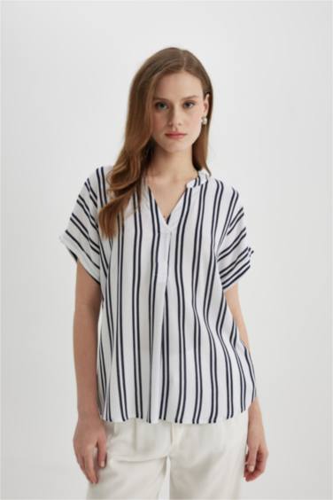 بلوزة نص كم قصة عادية بياقة مستديرة