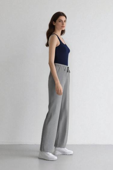 Pantalon large à taille élastique et poches