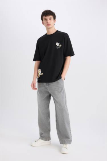 تيشيرت اوفر سايز برقبة مستديرة بطبعة توم وجيري