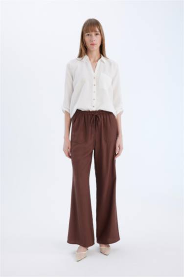 Pantalon large à taille haute avec poches