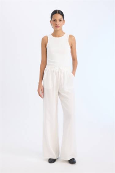 Прямые брюки с карманами, высокой талией, широкими ногами, длинные, из ткани кринкль