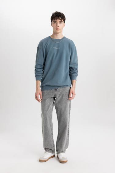 سويت شيرت فلورال قصة مريحة بياخة مستديرة