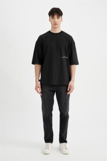 تيشيرت نص ردن قصة فضفاضة جيرسي بطبعة من الخلف