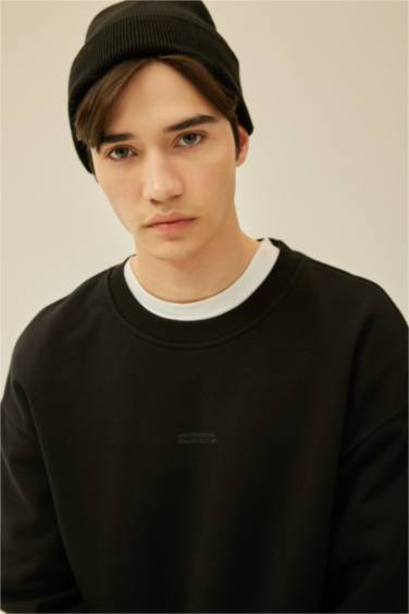 سويت شيرت أوفر سايز مطبوع برقبة مستديرة