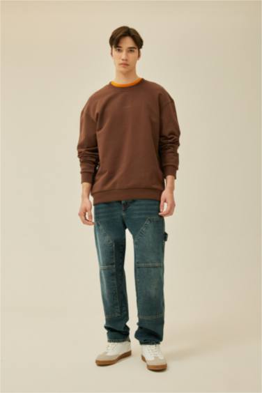 سويت شيرت أوفر سايز برقبة مستديرة