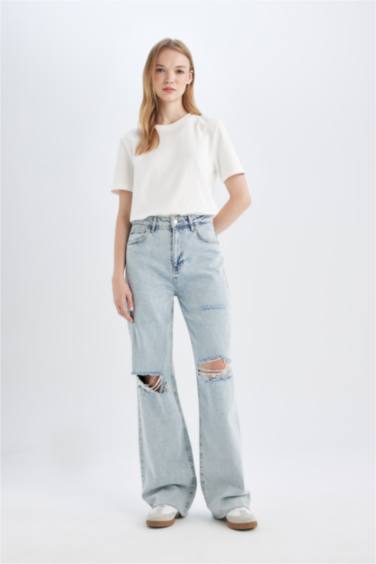 سروال جينز واسع برجل واسع وخصر عالي وخافة ممزقة