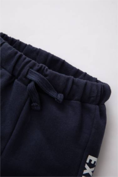 بنطلون سويت بانتس بيبي اولادي قصة عادية وطبعة شعار كحلي