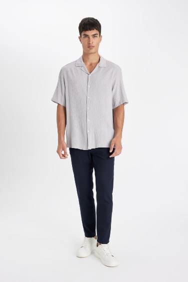 قميص نص كم قصة مريحة برقبة بولو