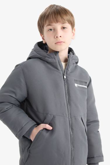 Manteau imperméable zippé à capuche et poches pour garçon