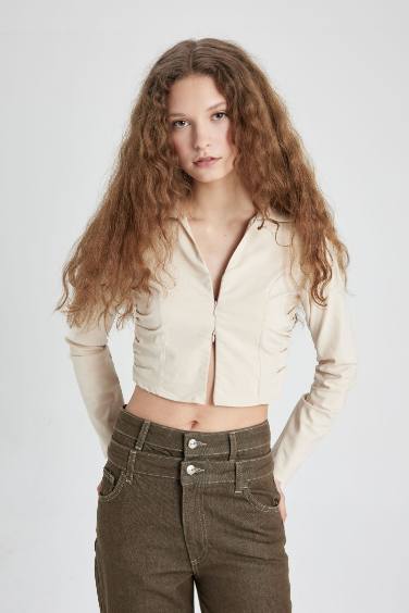 بلوزة سليم فيت كم طويل بياقة قميص