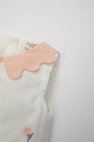 طقم بيبي بناتي بلوزة مطرزة وكلوت كتان قصة عادية - قطعتين