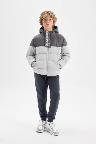 قمصلة نفخ ولادي مقاوم للماء بغطاء للرأس مبطن بالصوف