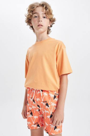 شورت بحر اولادي بطبعة نخيل