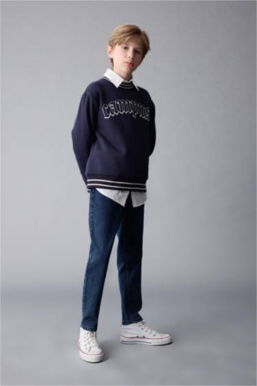 سروال جينز ولادي كاروت فيت برجل عادي وجيب