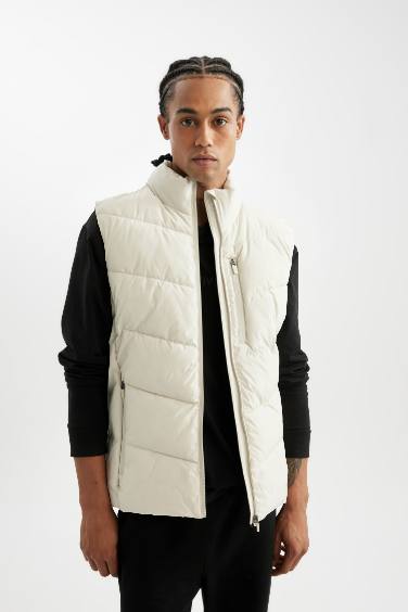 DeFactoFit Su İtici Rüzgar Geçirmez Normal Kesim Dik Yaka Fermuarlı Cepli Şişme Yelek