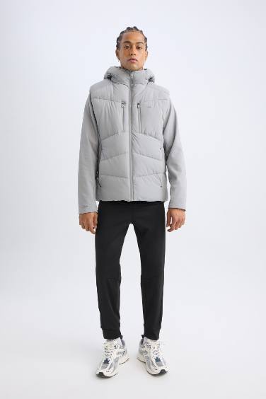 قمصلة نفخ قصة عادية بغطاء للرأس مقاوم للماء من  DeFactoFit