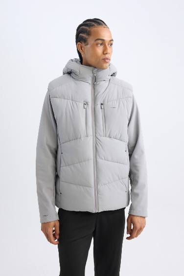 قمصلة نفخ قصة عادية بغطاء للرأس مقاوم للماء من  DeFactoFit