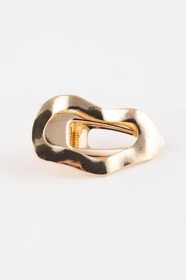 كلبس شعر حريمي ذهبي