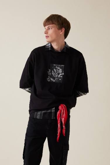 تيشيرت فلورال نص ردن قصة فضفاضة بياخة مستديرة