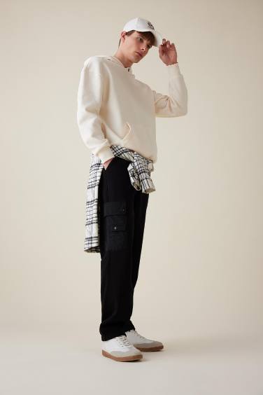 Штаны свободного кроя с карманами