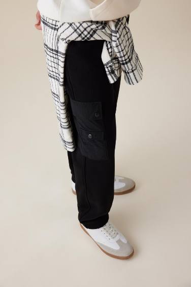 Штаны свободного кроя с карманами