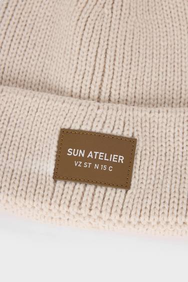 Bonnet à étiquette tissée pour homme