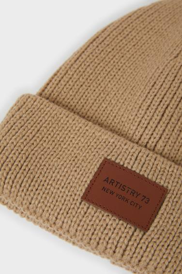 Bonnet à étiquette tissée pour homme