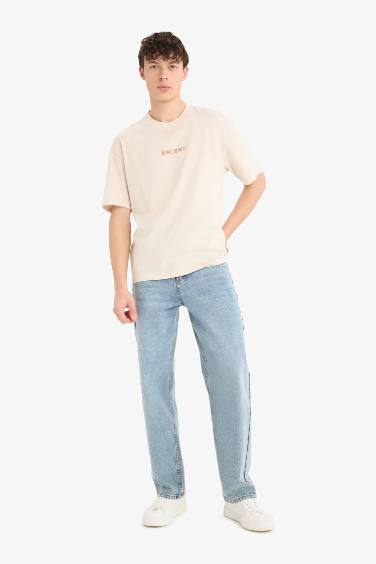 تيشيرت اوفر سايز بطبعة من الخلف برقبة مستديرة