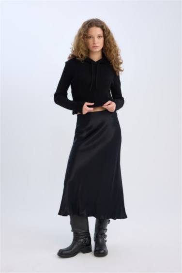 بلوفر تريكو قصة عادية بكابيشون