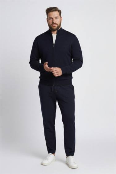 سترة تريكو قصة عادية بياقة مدورة