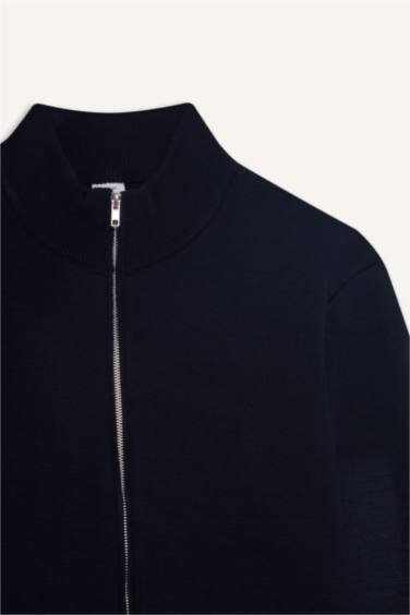 سترة تريكو قصة عادية بياقة مدورة