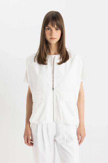 Gilet oversize à col rond avec fermeture éclair et poche