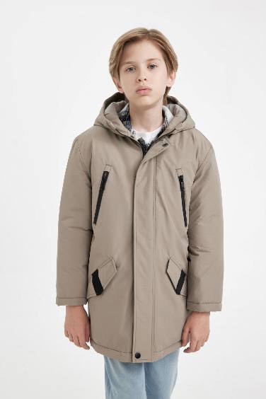 Ұлдарға бас киімді Пальто