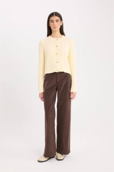 جاكيت تريكو قصة عادية بياخة مستديرة