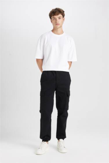 بنطلون كارجو جبردين قصة عادية بجيب بأستك من تحت