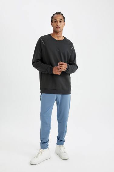 DeFactoFit Sporcu Jogger Eşofman Altı Standart Fit Beli Paçası Lastikli Cepli