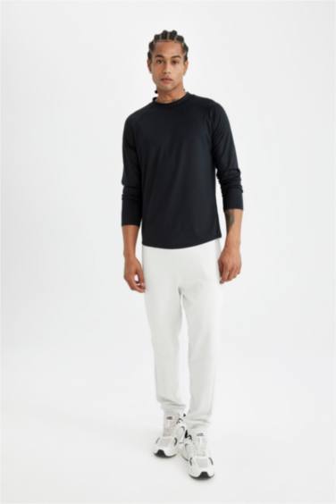 DeFactoFit Slim Fit Dar Kesim Dik Yaka Baskılı Uzun Kollu Sporcu Tişört