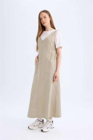 فستان جبردين قصة عادية بدون كم وياقة V