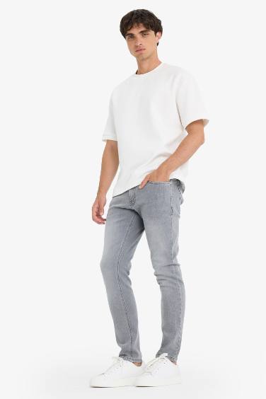 سروال جينز سليم للرجال بخصر عادي و جيوب