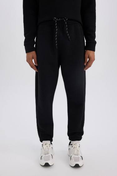 بنطلون بجامة رياضي قصة عادية من DeFactoFit