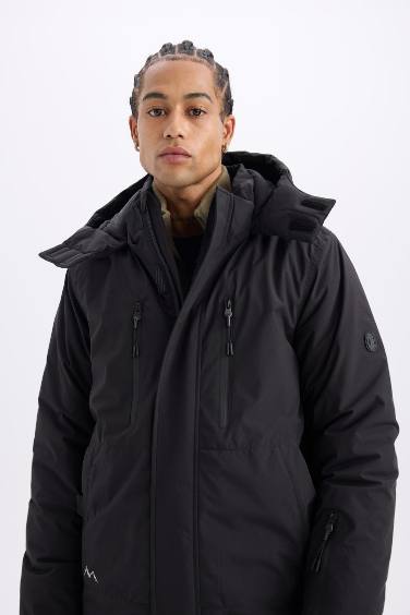 DeFactoFit Su İtici Rüzgar Geçirmez Kapüşonlu Polar Astarlı Ultra Korumalı Sıcak Tutan Kayak Montu