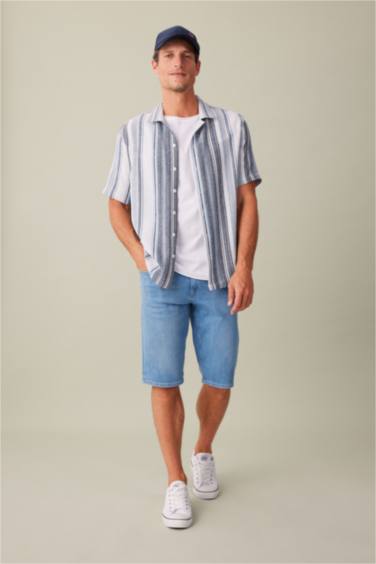 قميص مخطط نص ردن قصة عادية بياخة عالية