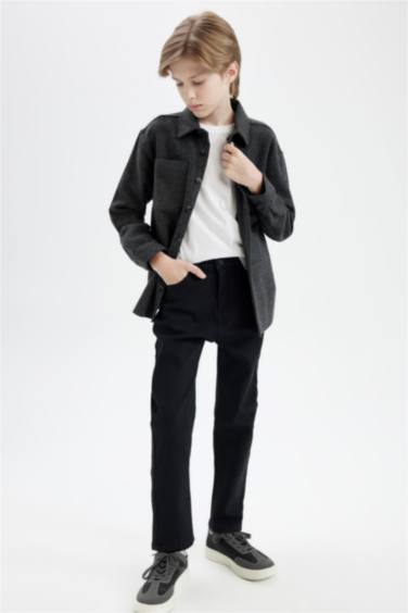 بنطرون جينز ولادي قصة عادية ورجل عادي