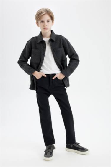 بنطرون جينز ولادي قصة عادية ورجل عادي